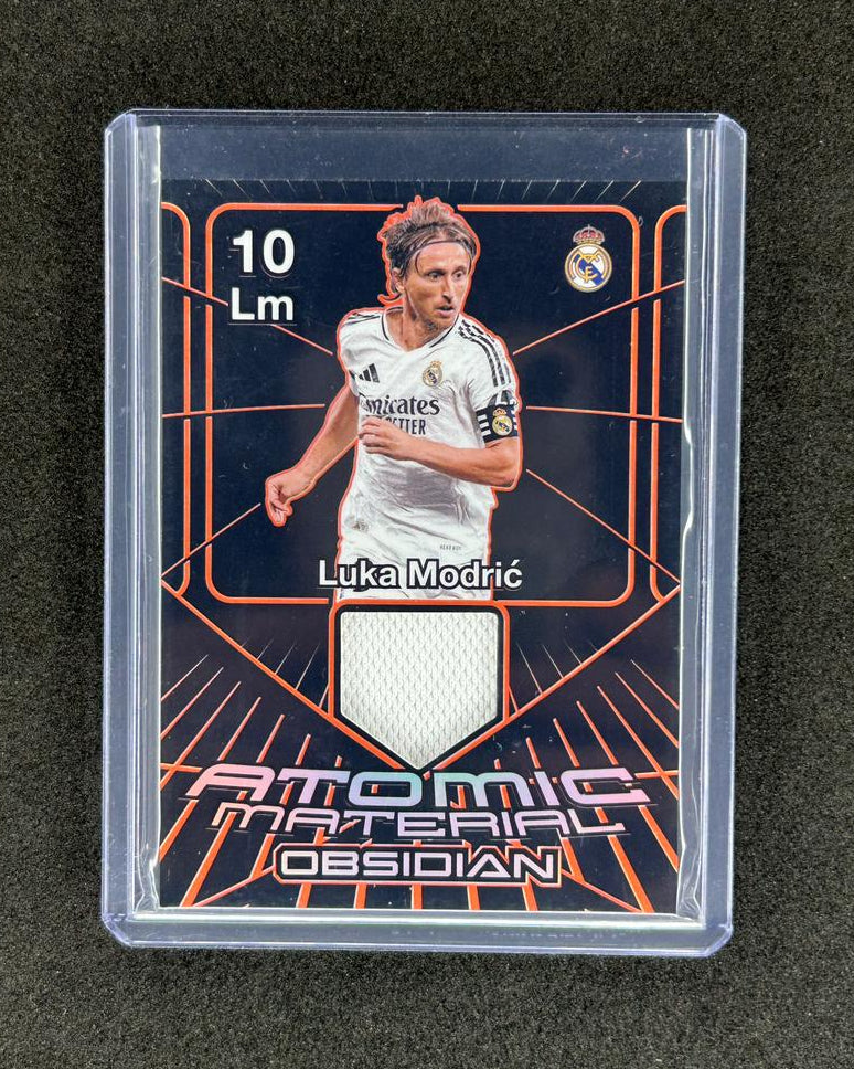 LUKA MODRIC - 2024-25 PANINI OBSIDIAN ATOMIC MATERIAL #AM-LMO /99 PATCH